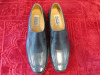 Pair of Manz Black Slip On Shoes. Size 13 1/2. Appear New/Unworn.