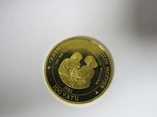 1997 Vanuatu Gold Proof 100 Vatu Coin. Commemorating Queen Mother & Princess Diana with Baby William. Weight 7.76g, Dia 25mm, 14 Carat Gold. Comes in Pouch (Missing Certificate).