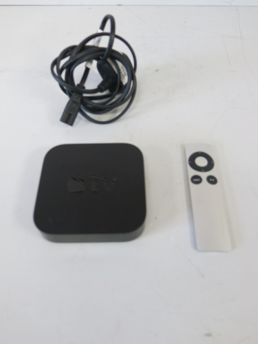 Apple TV, Model A1469. Comes with Remote & Power Supply.