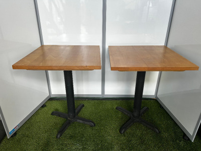 24 x Assorted Sized Oak Effect Wooden Top Restaurant/Caf&eacute; Tables with Cast Metal Bases to Include: 18 x H75 x W60 x D60cm, 5 x H75 x W85 x D 85 & 1 x H75 x W100 x D100cm.