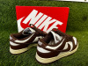 Pair of Nike Dunk Low in Sail/Cacao Wow-Coconut Milk, Size 3. Comes in Box. NOTE: hardly worn in very good condition. - 2