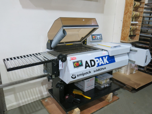 AdPak SmiPack, S560NA Automatic L Sealing Machine, S/N 12313. Year 2021. Comes with Manual.