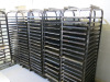 6 x Stainless Steel 18 Tier Mobile Oven Racks. Comes with 104 x Stainless Steel Trays.