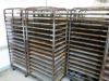 8 x Metal Mobile 16 Rack Trolleys with Back Bars. Comes with 128 Trays. Size H178 x W52 x D77cm.