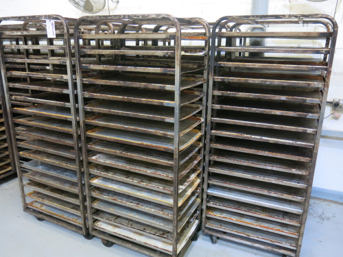 8 x Metal Mobile 16 Rack Trolleys with Back Bars. Comes with 128 Trays. Size H178 x W52 x D77cm.