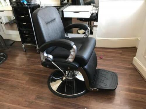 Professional Barbers Chair on Chrome Base in Black PVC. Pump-Up Chair, Tilting Back with Adjustable Head Rest.