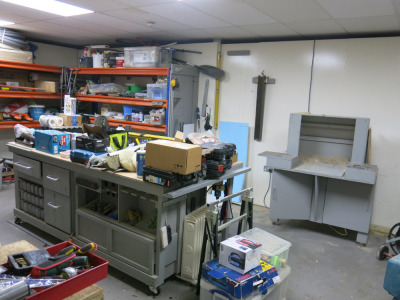 Entire Contents of Maintenance Room to Include: 2 x Mobile Benches with Vices & Cupboards, Wooden Mitre Saw Housing, Armor Gard Tuff Bank, Assorted Tool Bags & Cases, Various Spares, Parts, Accessories, Consumables, Tools, Band Wrapper, Motors & 4 Bays of