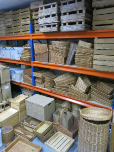 Contents of Market, Event & Pop Up Room to Include: Large Quantity of Wicker Baskets, Wooden Crates, Trays & Displays, Glassware, Napkins, Bags, Labels, Decorations, Display Stand, Folding Tables, Shrink Wrap Etc (As Viewed/Pictured).