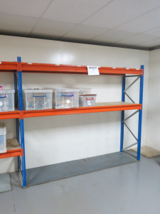 Room Containing Orange & Blue Boltless Racking to Include: 13 x 200cm Uprights, 28 x 240cm & 12 x 180cm Beams & 14 x 240cm Boards & 8 x 180cm.