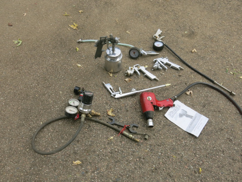 Selection of Air Guns & Equipment Including: 1 x Clarke Impact Driver, 4 x Spray Guns, 2 x Air Gauges and 1 x Oxygen Gauge.