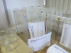 Large Quantity of Laboratory Glassware to Include: 70 x Funnels (60mm 75mm), 12 x Density Bottles, 14 x Weighing Bottles, 25 x Assorted Capacity Measuring Cylinders with Spouts, 62 x 600ml Glass Beakers, Quantity of 100mm Clear Watch Glasses with Ground - 4