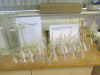 Large Quantity of Laboratory Glassware to Include: 70 x Funnels (60mm 75mm), 12 x Density Bottles, 14 x Weighing Bottles, 25 x Assorted Capacity Measuring Cylinders with Spouts, 62 x 600ml Glass Beakers, Quantity of 100mm Clear Watch Glasses with Ground - 8