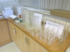 Large Quantity of Laboratory Glassware to Include: 70 x Funnels (60mm 75mm), 12 x Density Bottles, 14 x Weighing Bottles, 25 x Assorted Capacity Measuring Cylinders with Spouts, 62 x 600ml Glass Beakers, Quantity of 100mm Clear Watch Glasses with Ground - 10