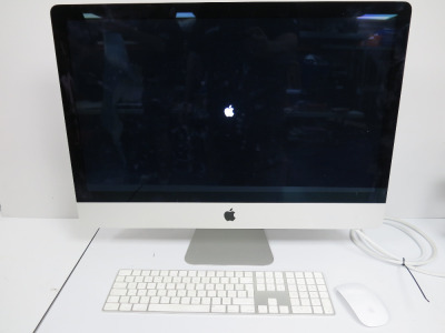 'Apple 5K iMac 27", Model A2115, S/N H12FJJ3PPN7C. Running Mac OS Sonoma. Intel Core i9, 3.6Ghz, 64GB RAM, 1TB SSD, Radeon Pro 5700 XT 16GB Graphics. Comes with Wireless Keyboard & Mouse.