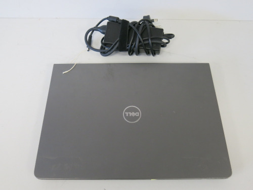 Dell Vostro P75G 13.5" Laptop. 8GB RAM &256 SSD. Comes with Power Supply. NOTE: For Spares or Repair (A/F).