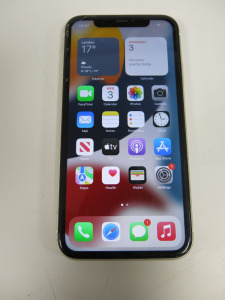 Apple iPhone 11, 64GB In White. NOTE: crack to screen