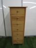 7 Drawer Pine Tall Cabinet. Size 125cm x 43 x 40cm.