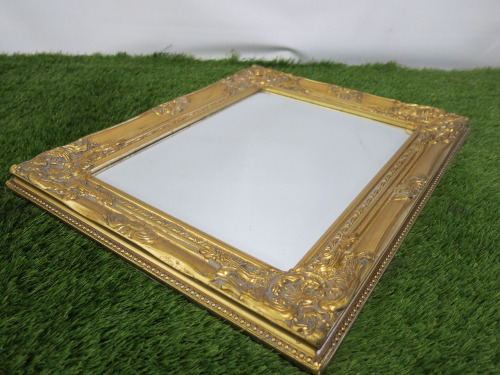 Small Wall Bevel Edged Mirror in Gold Coloured Embossed Frame. Size 52 x 43cm.