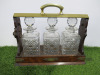 Tantalise with 3 Crystal Decanters. NOTE: locked no key.