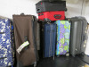 8 x Assorted Style, Size & Make of Suitcases.