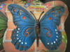 10 x Misc Items to Include: 4 x Tin Butterfly's, 3 x Coat Hooks, 1 Magic Pebbles & 2 Pairs New Socks. - 2