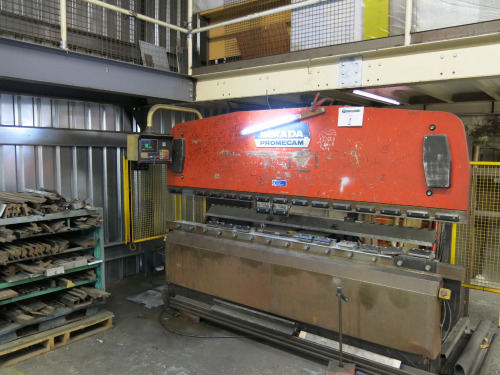 Amada Promecam 1000T Press Brake with Hunco Autobend AB5/S7. S/N IT2 100 30 0381, 3 Phase, DOM 01/11/1987. Comes with Smartscan Lightguard & Large Rack of Assorted Tooling. NOTE: Additionall access may be granted by the landlord to facilitate the removal 