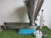 Aviteq Vibration Filler with 3000 Oscillations p/minVariable Speed Controller , Model KF12-Y, S/N V206350, DOM 2021. Comes with Stainless Steel Feed Hopper and Trough on Adjustable Mobile Tubular Frame.
