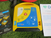 Saver One Portable Defibrillator in Case with Attachments. S/N 17SA005042200079, Year 04/2022. - 2
