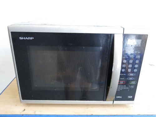 Sharp 800w Microwave, Model R-6579 (SL), S/N 081219309.