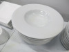 Approx 105 x Pieces of White Crockery to Include Olympia, Porcelite, Genware & Titan to Include: 40 x Dinner Plates, 10 x Pasta Bowls, 10 x Bowls, 25 x Side Plates, 3 x Serving Dishes, 9 x Small Side Bowls & 6 x Jugs. - 11