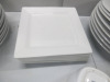 Approx 105 x Pieces of White Crockery to Include Olympia, Porcelite, Genware & Titan to Include: 40 x Dinner Plates, 10 x Pasta Bowls, 10 x Bowls, 25 x Side Plates, 3 x Serving Dishes, 9 x Small Side Bowls & 6 x Jugs. - 12