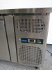 Adexia 3 Door Undercounter Mobile Stainless Steel Preparation Fridge. Model GN3100TN. Size H84 x W179 x D70cm. - 2