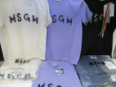 15 x MSGM Milano T-Shirts with 'MSGM' Motif, Cotton to Include: 8 x Black, 4 x Purple & 3 x Cream in Assorted Sizes, RRP £180 each. Total RRP £2700.00.