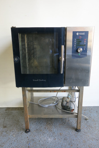 Houno 6 Grid Combi Oven, Model C 1.06, S/N 171170275, 3 Phase. Comes on Stainless Steel Table. Size H152 x W90 x D81cm. NOTE: requires plug.