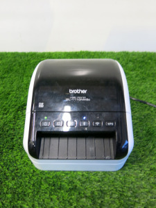 Brother Label Printer, Model QL-11ONWBc. Comes with Power Supply & Roll of Printer Labels.