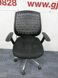 Black Hard Back Swivel Height Adjustable Office Chair on Chrome Base.