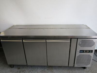 Adexa 3 Door Undercounter Mobile Stainless Steel Preparation Fridge. Model GN3100TN. Size H84 x W179 x D70cm.