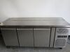 Adexa 3 Door Undercounter Mobile Stainless Steel Preparation Fridge. Model GN3100TN. Size H84 x W179 x D70cm.