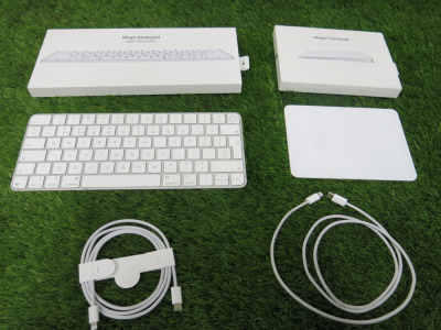 2 x Apple Accessories to Include: 1 x Magic Trackpad, Model A1535 & 1 x Apple Magic Keyboard with Touch ID.