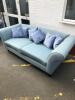 Borne Interiors 3 Seater Sofa Upholstered in Green Fabric on Black High Gloss Finish Feet with 6 Blue Crushed Velvet Cushions. Size H78cm x D85cm x W220cm - 3