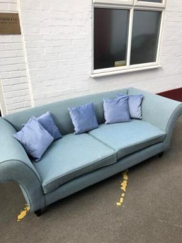 Borne Interiors 3 Seater Sofa Upholstered in Green Fabric on Black High Gloss Finish Feet with 5 Blue Crushed Velvet Cushions. Size H78cm x D85cm x W220cm