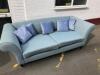 Borne Interiors 3 Seater Sofa Upholstered in Green Fabric on Black High Gloss Finish Feet with 5 Blue Crushed Velvet Cushions. Size H78cm x D85cm x W220cm - 3