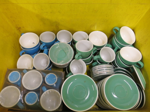 102 x Pieces of Acme & Co Coffee Cups & Saucers to Include: 11 x Green Cappuccino Cups, 27 x Green Cappuccino Saucers, 9 x Green Espresso Cups, 20 x Green Espresso Saucers, 17 x Blue Cappuccino Cups & 18 x Blue Espresso Cups.