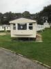 Willerby Richmond 2 Bedroom/4 Berth Double Glazed Static Caravan. Year 2006, S/N WB2018-8, Size 33' x 12'. Layout Includes Open Kitchen, Diner & Living Room, 1 x Double Bedroom, 1 x Twin Bedroom & Bathroom. Contents to Include: 2 Seater Cream Leather Sofa - 2