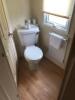 Willerby Richmond 2 Bedroom/4 Berth Double Glazed Static Caravan. Year 2006, S/N WB2018-8, Size 33' x 12'. Layout Includes Open Kitchen, Diner & Living Room, 1 x Double Bedroom, 1 x Twin Bedroom & Bathroom. Contents to Include: 2 Seater Cream Leather Sofa - 9