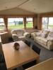 Willerby Richmond 2 Bedroom/4 Berth Double Glazed Static Caravan. Year 2006, S/N WB2018-8, Size 33' x 12'. Layout Includes Open Kitchen, Diner & Living Room, 1 x Double Bedroom, 1 x Twin Bedroom & Bathroom. Contents to Include: 2 Seater Cream Leather Sofa - 13