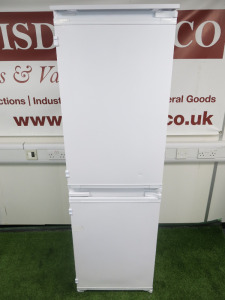 New Beko Built In Fridge Freezer, Model 7518920016c, S/N 2210369912. Size H177 x W56 x D55cm. NOTE: dent to door (As Viewed/Pictured).