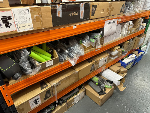 4 x Shelves of Assorted GTECH & GTECH Pro Spares & Accessories to Include: Heads, Battery Pack, Bin Assembly, Pivot Yoke, Power Floor Head Nylon End Cap, Filters etc (As Viewed/Inspected).