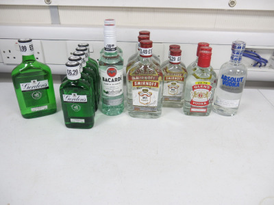 17 x Assorted Sized Bottles of Gin, Vodka & Rum to Include: 1 x Gordons Gin 35cl, 5 x Gordons Gin 20cl, 2 x Bacardi Rum 35cl, 3 x Smirnoff Vodka 35cl, 2 x Smirnoff Vodka 20cl, 3 x Glens Vodka 20cl & 1 x Absolut Vodka 35cl.