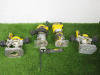 2 x DeWalt Compact Routers & Accessories to Include: DCW600 Cordless Brushless Router & D26204 240v Router with 2 x Guides & 1 x 18v 4AH Battery. NOTE: requires charger.